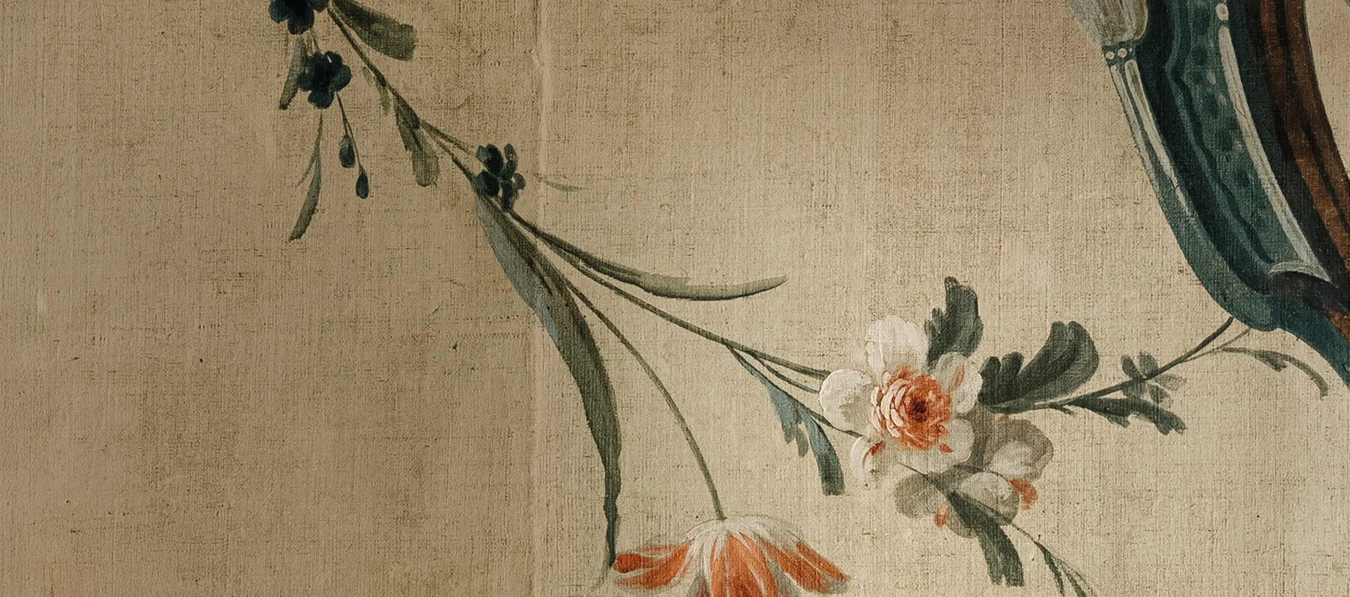 Close-up detail shot of a blooming plant on a brown fabric background.