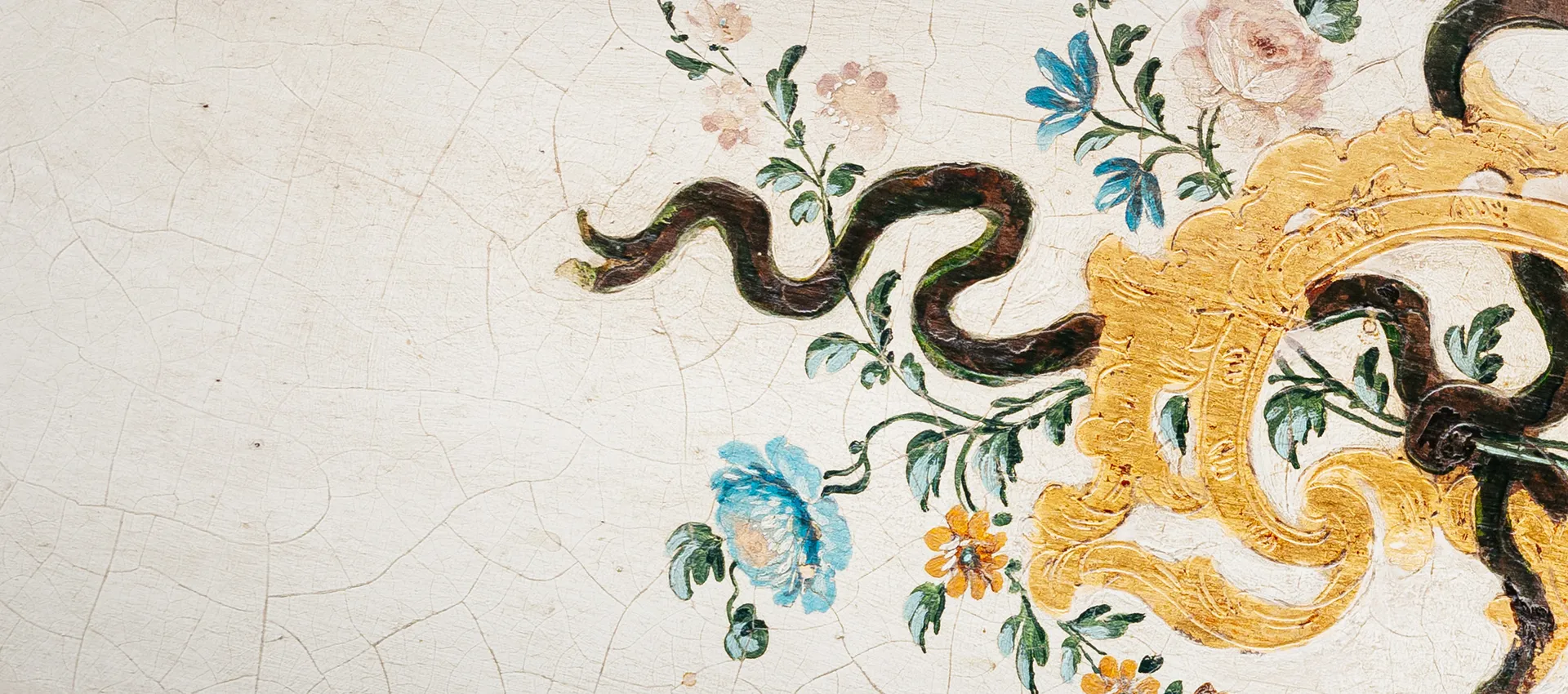 Painting with curved, winding shapes on a white background in black, blue, and yellow